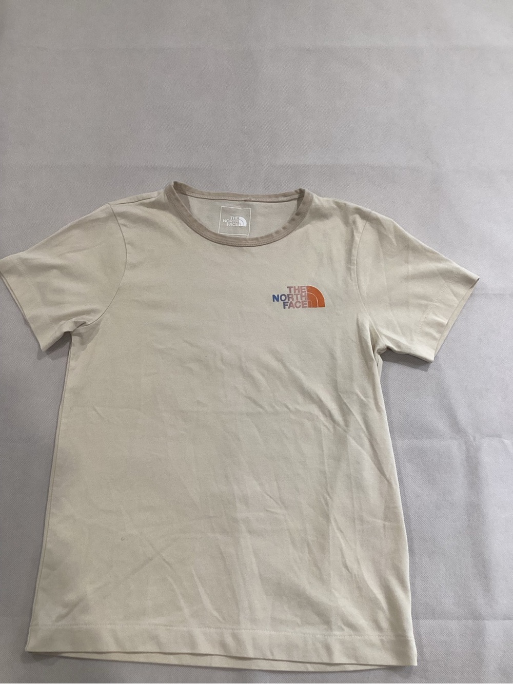 The North Face Cream Short Sleeve Tee with Orange Logo size small 9/2